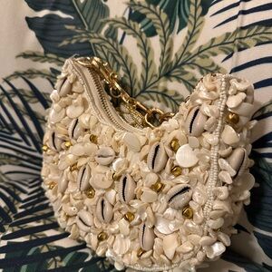 Shell Embellished Cream Clutch